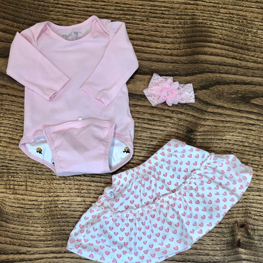 Pink bodysuit with matching skirt